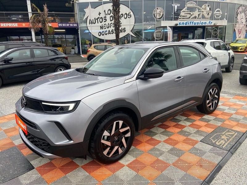 Gris Occasion 2024 Opel Mokka Elegance SUV | 19 450 € (Bon prix) - Image 1/4