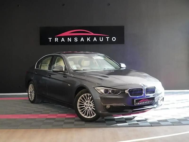 Gris Occasion 2012 BMW 320 Luxury Line Berline | 11 490 € (Super prix) - Image 1/4