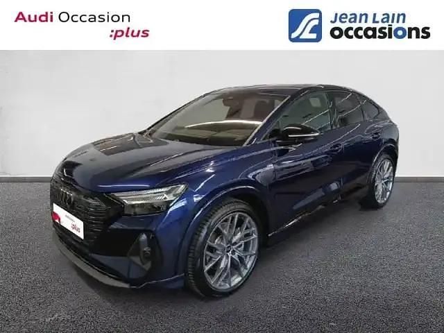 Bleu navarre metallise Utilisé 2024 Audi Q4 Sportback e-tron Advanced SUV | 47 990 € (Prix juste) - Image 1/4