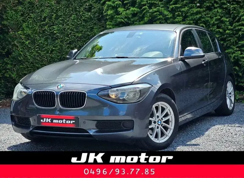 Gris Utilisé 2012 BMW 118 Citadine | 5 499 € (Prix juste) - Image 1/4