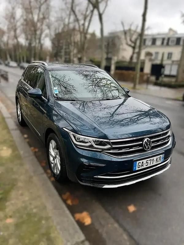 Bleu Occasion 2021 VW Tiguan Exclusive SUV | 28 900 € (Bon prix) - Image 1/4