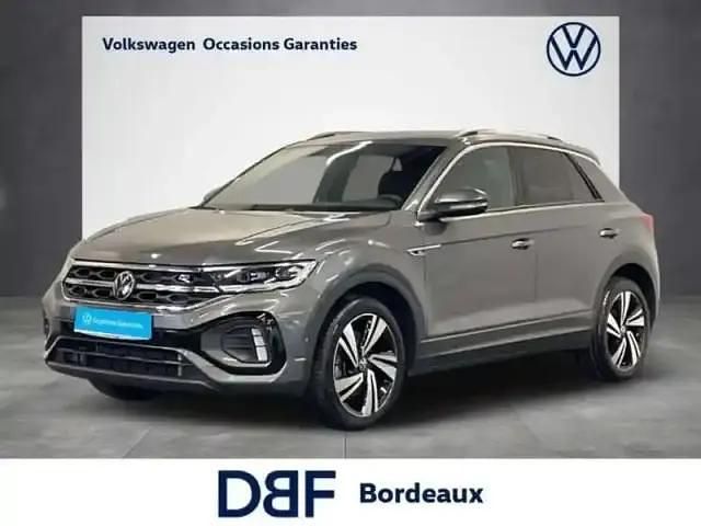 Gris Occasion 2022 VW T-Roc R-line SUV | 28 499 € (Prix juste) - Image 1/4