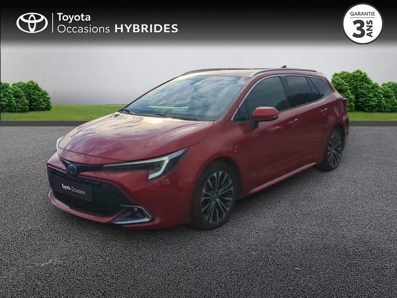 Rouge intense métallisé Occasion 2023 Toyota Corolla Design Break | 26 980 € (Prix juste) - Image 1/4