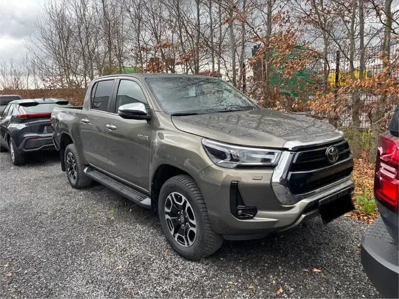 Gris Utilisé 2022 Toyota HiLux Lounge Pick-up | 52 990 € - Image 1/4