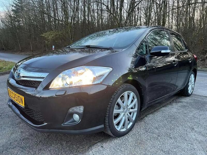 Noir Occasion 2010 Toyota Auris Hybrid Executive Berline | 9 990 € (Super prix) - Image 1/4