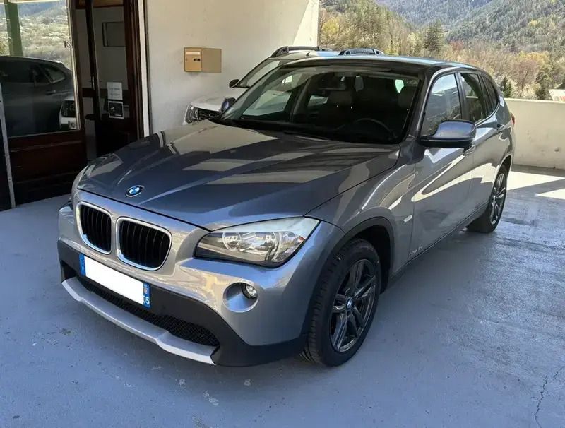 Gris Occasion 2012 BMW X1 Sport Line SUV | 9 900 € (Prix juste) - Image 1/4