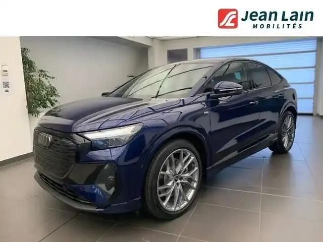 Bleu navarre metallise Utilisé 2024 Audi Q4 Sportback e-tron Advanced SUV | 51 490 € (Prix assez cher) - Image 1/4