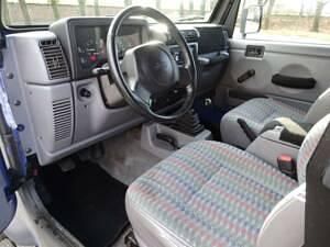 Occasion Jeep Wrangler Sport 118 ch (86 kW) 1997 Gris SUV