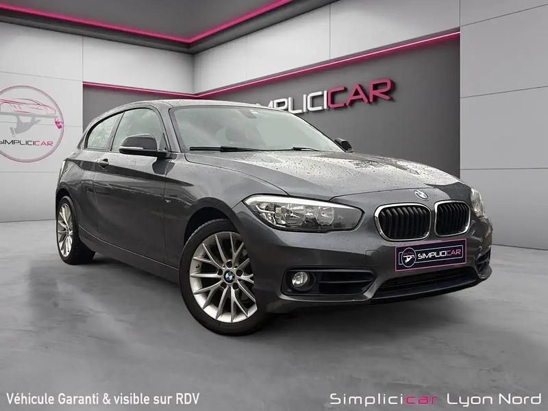 Gris Occasion 2015 BMW 118 Sport Line Citadine | 10 480 € (Prix juste) - Image 1/4