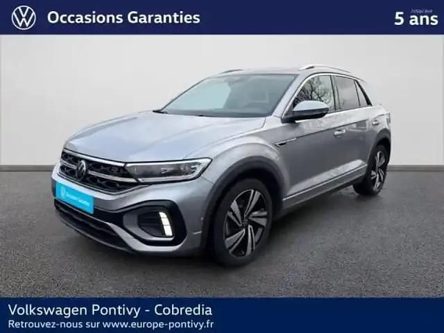 Gris pyrite métallisée Occasion 2023 VW T-Roc R-line SUV | 29 990 € (Prix juste) - Image 1/4