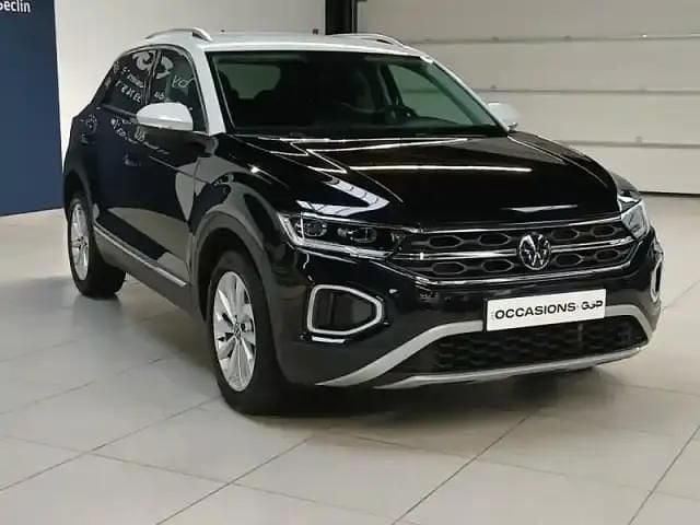 Deep black pearlescent Occasion 2024 VW T-Roc Style SUV | 26 499 € (Bon prix) - Image 1/3