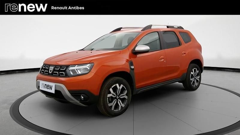 Orange Utilisé 2021 Dacia Duster Prestige SUV | 18 999 € (Prix juste) - Image 1/4