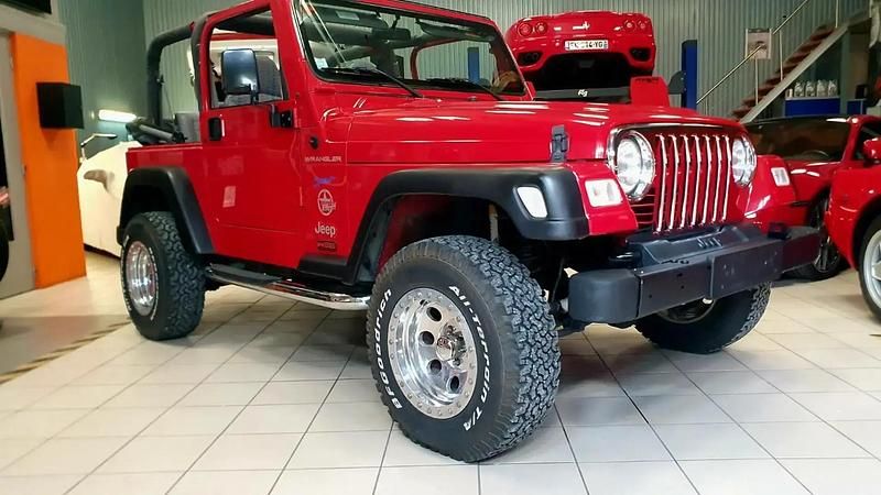 Rouge Occasion 1997 Jeep Wrangler Sport SUV | 21 900 € - Image 1/4