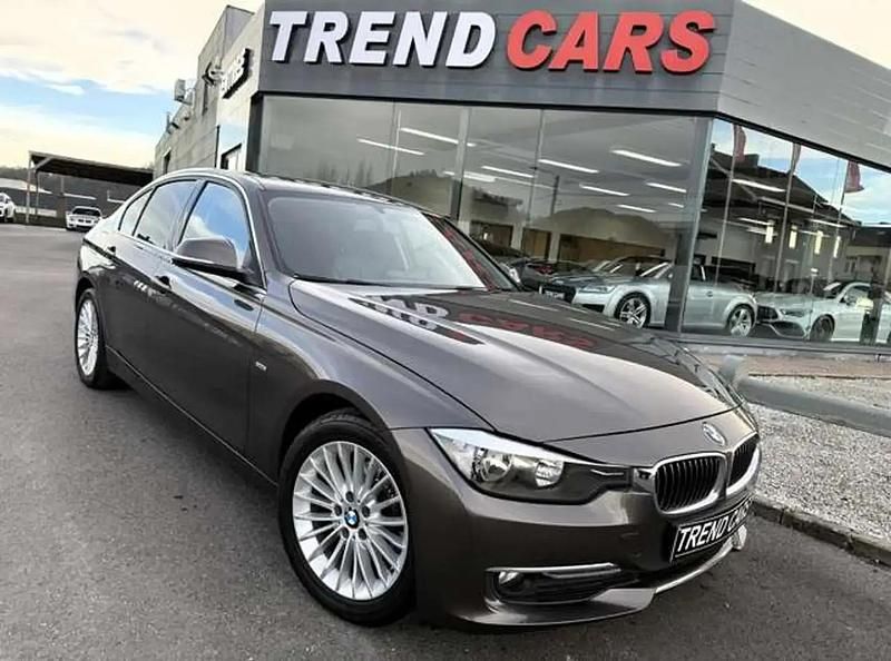 Brun Occasion 2012 BMW 318 Luxury Line Berline | 12 999 € (Prix assez cher) - Image 1/4