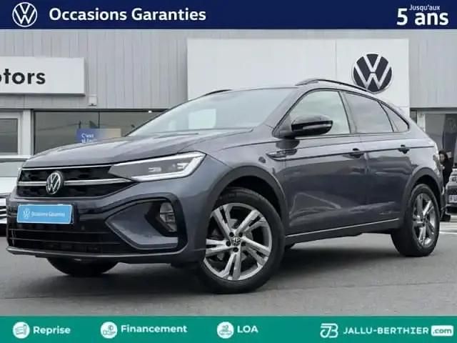 Gris cendré métallisée/toit noir Occasion 2022 VW Taigo R-line SUV | 22 889 € (Prix juste) - Image 1/4