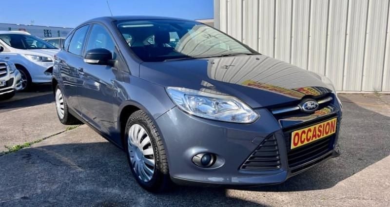 Gris Occasion 2011 Ford Focus Trend Berline | 8 990 € (Prix assez cher) - Image 1/4