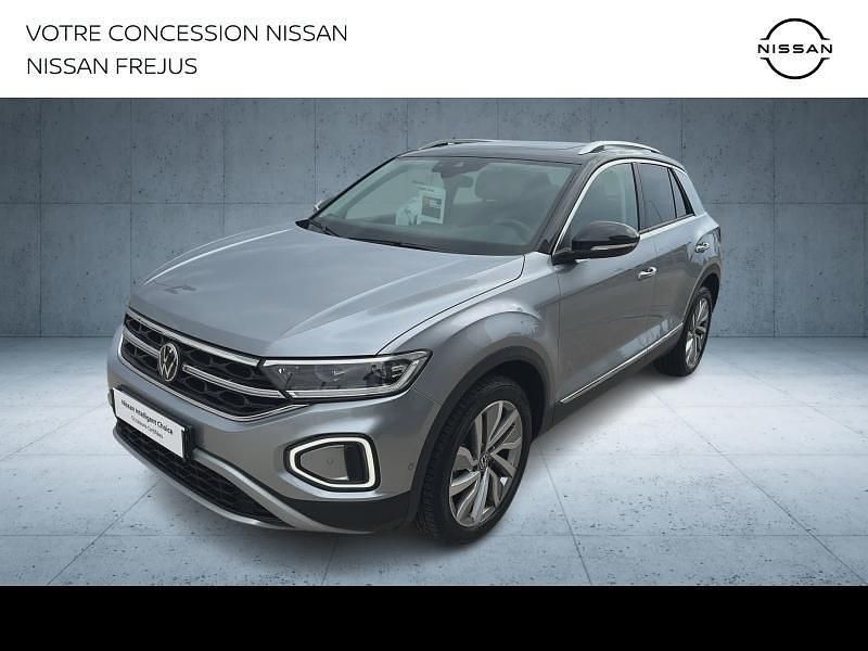 Gris ascot/toit noir Utilisé 2023 VW T-Roc Exclusive SUV | 29 490 € (Prix juste) - Image 1/4
