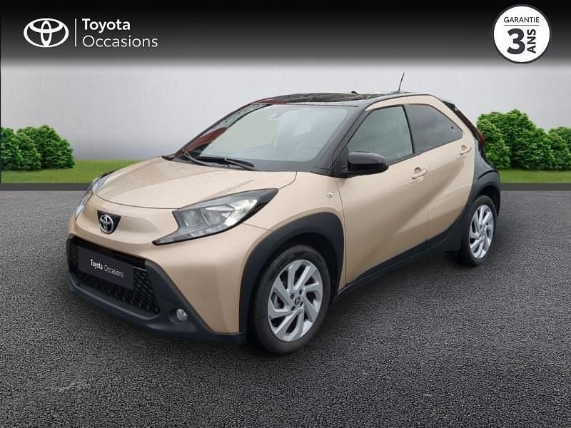 Biton beige gingembre métal/toit noir Occasion 2022 Toyota Aygo X Design SUV | 14 480 € (Prix juste) - Image 1/4