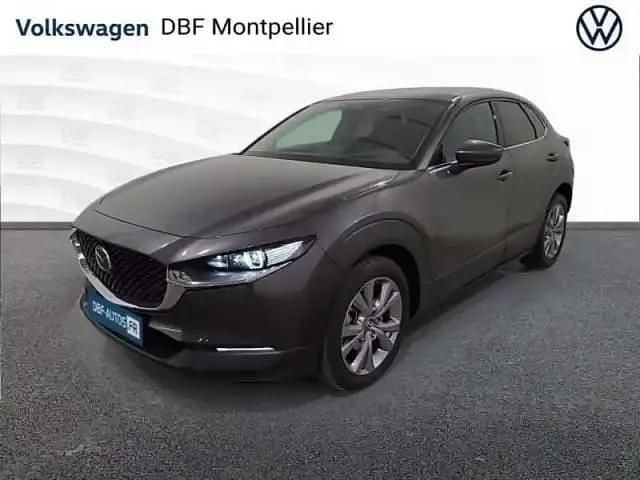 Gris Occasion 2023 Mazda CX-30 Exclusive-Line SUV | 26 880 € (Bon prix) - Image 1/4