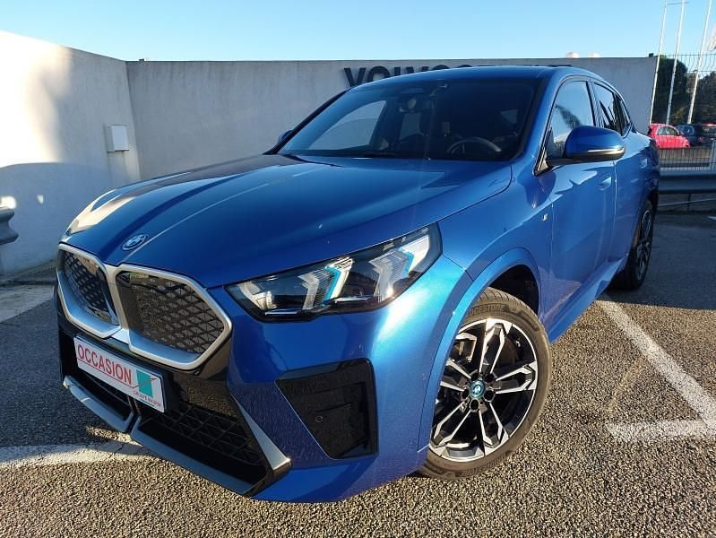 M portimao blau métallisé Utilisé 2024 BMW iX2 M Sport SUV | 35 990 € (Bon prix) - Image 1/4