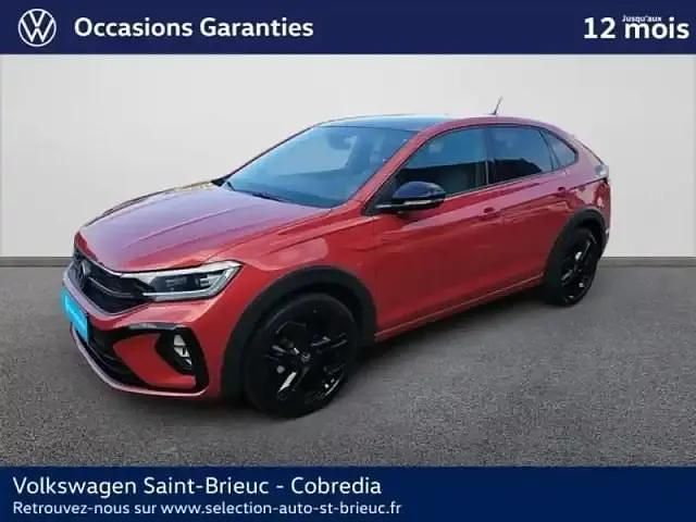 Rouge roi métallisée Utilisé 2025 VW Taigo R-line Edition SUV | 29 990 € (Prix juste) - Image 1/4