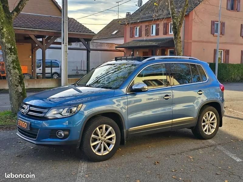 Bleu Occasion 2015 VW Tiguan LOUNGE SUV | 15 990 € (Prix assez cher) - Image 1/4