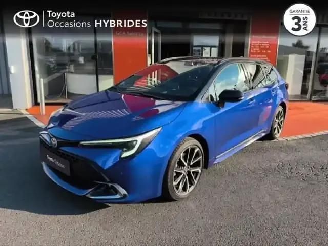 Bi ton bleu genievre noir Utilisé 2023 Toyota Corolla Break | 34 990 € (Prix cher) - Image 1/4