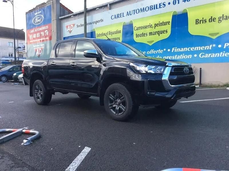 Noir Occasion 2021 Toyota HiLux Pick-up | 37 900 € (Bon prix) - Image 1/4