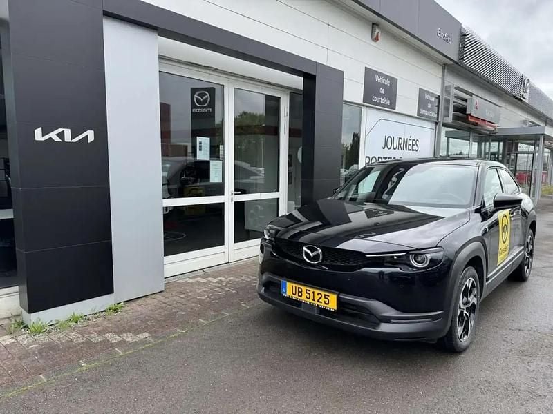 Orange Utilisé 2024 Mazda MX30 Makoto SUV | 24 861 € - Image 1/4