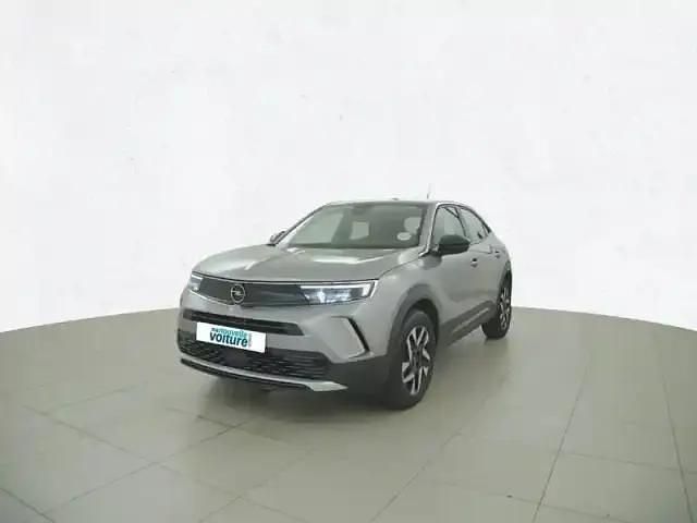 Gris Utilisé 2023 Opel Mokka-e Elegance SUV | 19 990 € (Prix juste) - Image 1/4