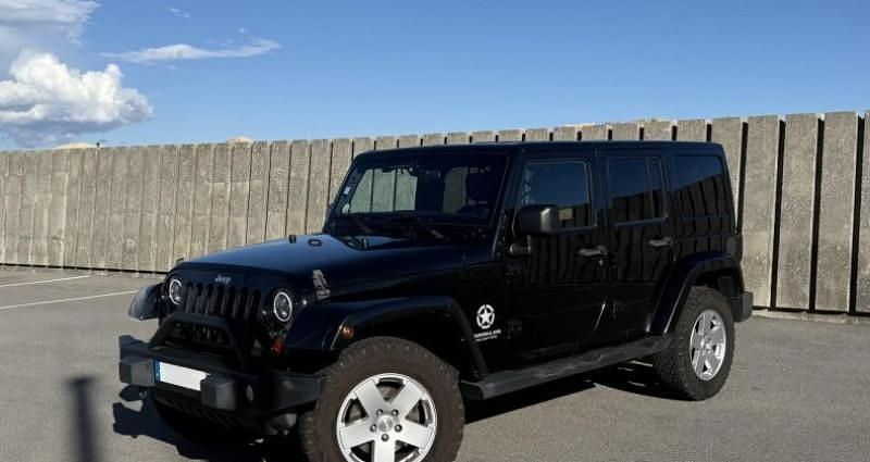 Noir Utilisé 2013 Jeep Wrangler Unlimited Sahara SUV | 29 990 € - Image 1/4