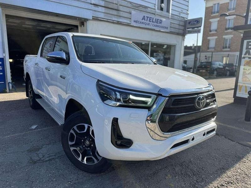 Occasion Toyota HiLux 205 ch (150 kW) 2023 Blanc Pick-up