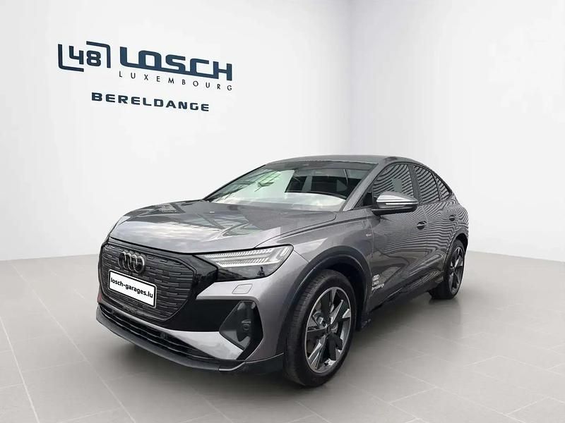 Gris Utilisé 2025 Audi Q4 Sportback e-tron Sport SUV | 56 307 € - Image 1/4