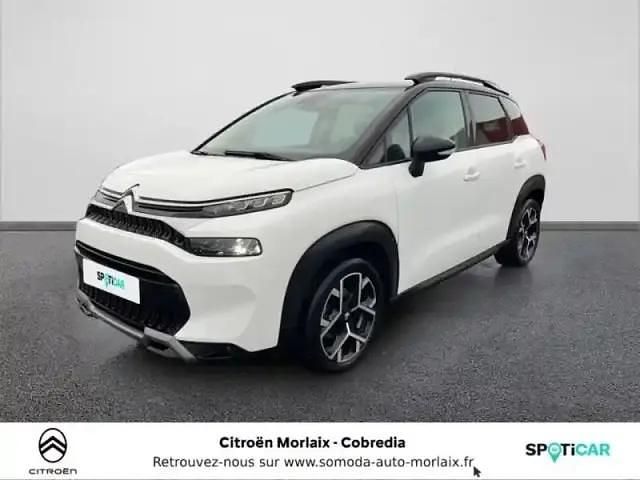 Blanc banquise (o) + noir perla nera Occasion 2023 Citroën C3 Aircross PureTech SUV | 16 490 € (Prix juste) - Image 1/4