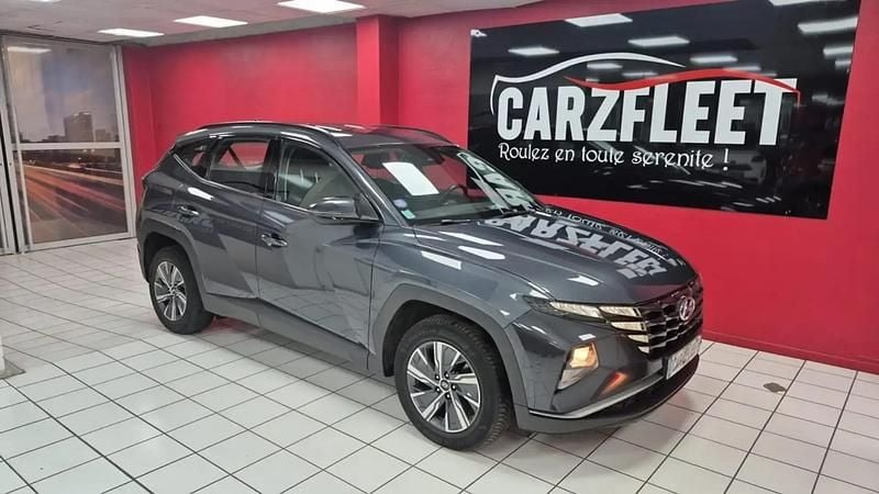 Gris Occasion 2022 Hyundai Tucson SUV | 15 990 € (Prix juste) - Image 1/4