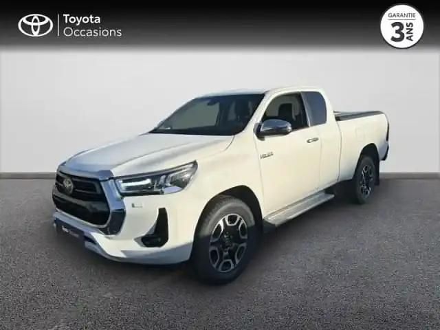 Blanc pur Occasion 2024 Toyota HiLux Lounge Pick-up | 49 990 € (Prix juste) - Image 1/4