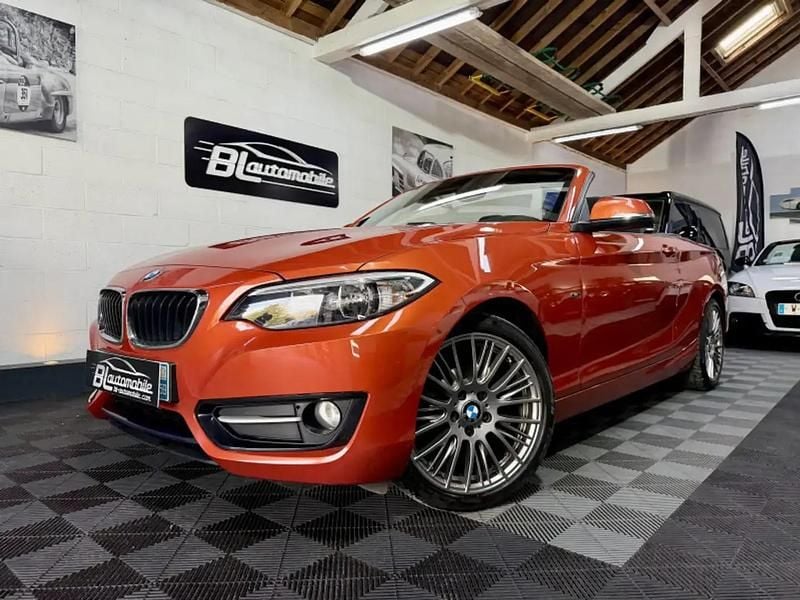 Orange Occasion 2015 BMW 220 Sport Line Cabriolet | 16 980 € (Prix juste) - Image 1/4