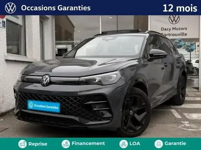 Gris Occasion 2024 VW Tiguan Exclusive SUV | 48 489 € - Image 1/4