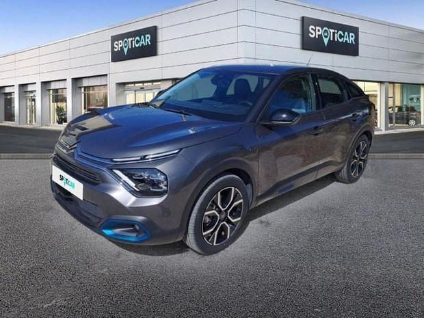 Gris Utilisé 2022 Citroën e-C4 Shine | 19 499 € (Prix assez cher) - Image 1/4
