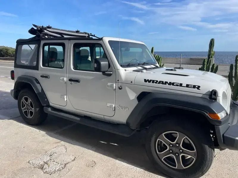 Blanc Utilisé 2019 Jeep Wrangler Unlimited Sport SUV | 39 900 € (Prix assez cher) - Image 1/4