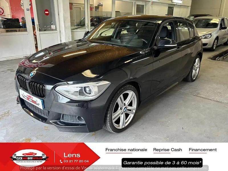 Noir Utilisé 2013 BMW 118 Sport Line Citadine | 10 499 € (Prix juste) - Image 1/4