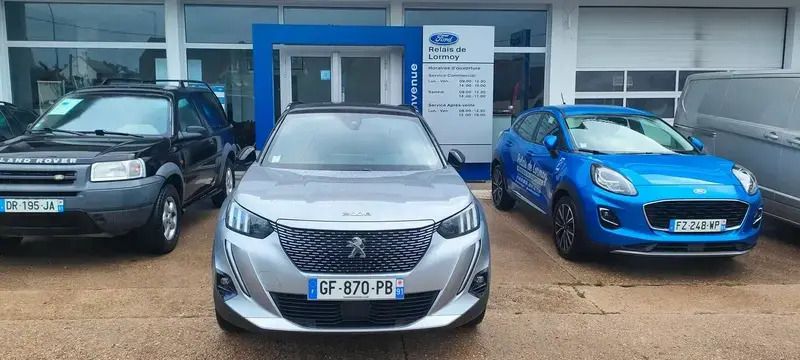 Gris Utilisé 2022 Peugeot e-2008 GT SUV | 26 890 € (Prix cher) - Image 1/4