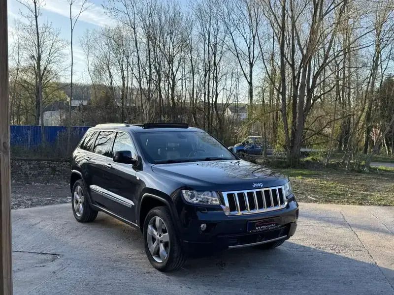 Gris Utilisé 2013 Jeep Grand Cherokee Overland SUV | 24 990 € - Image 1/4