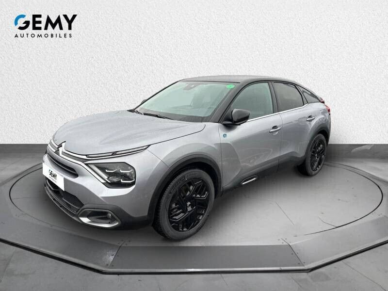 Gris Utilisé 2023 Citroën e-C4 Berline | 22 485 € (Prix juste) - Image 1/4