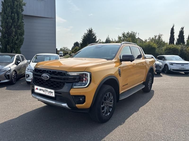 Orange Utilisé 2023 Ford Ranger Wildtrack Pick-up | 48 999 € - Image 1/4