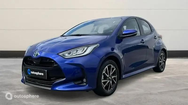 Bleu Utilisé 2023 Toyota Yaris Hybrid Design Berline | 21 999 € (Prix juste) - Image 1/4