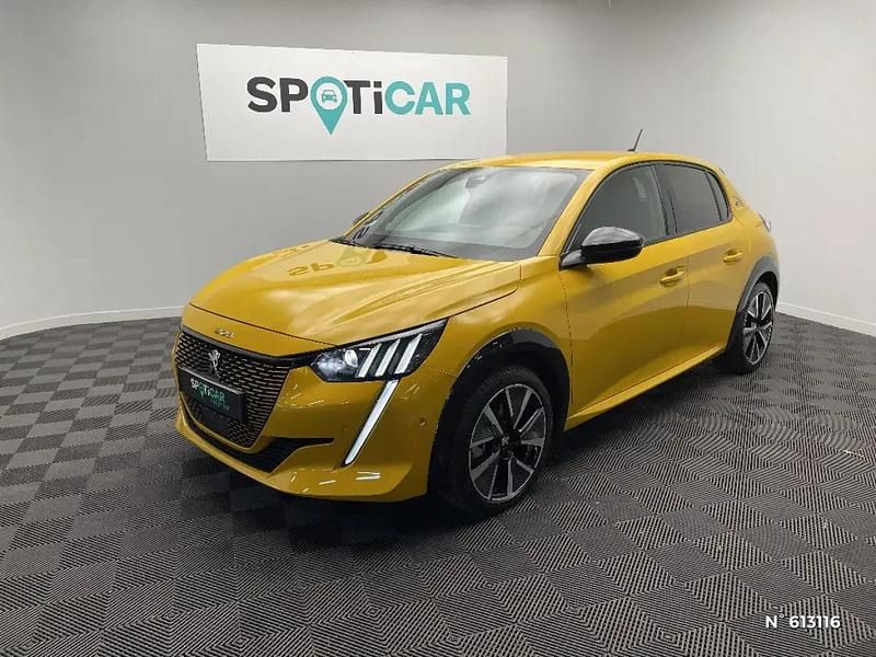 Jaune Utilisé 2022 Peugeot e-208 GT Citadine | 18 990 € (Prix juste) - Image 1/4