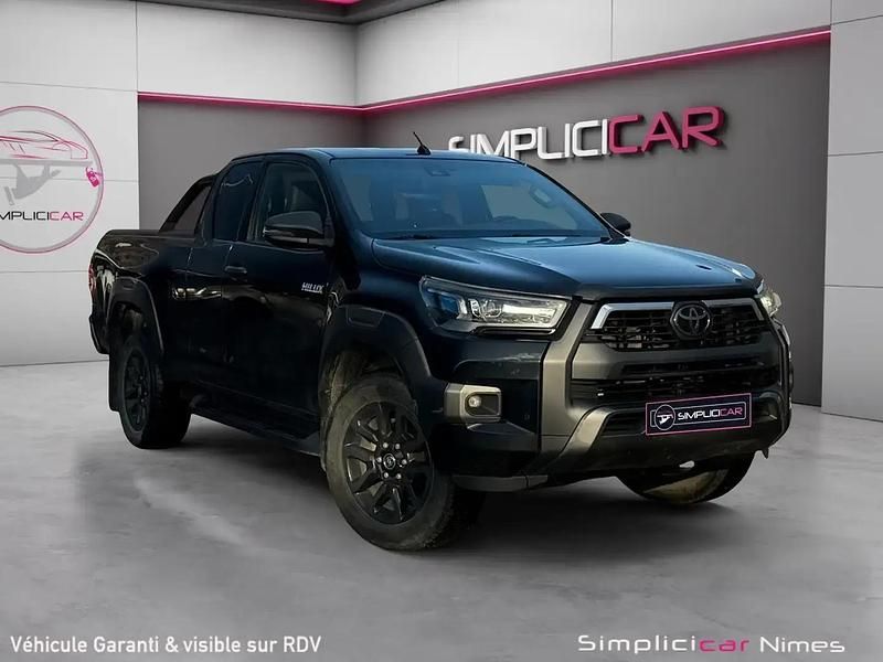 Noir Occasion 2021 Toyota HiLux Pick-up | 44 980 € (Prix assez cher) - Image 1/4