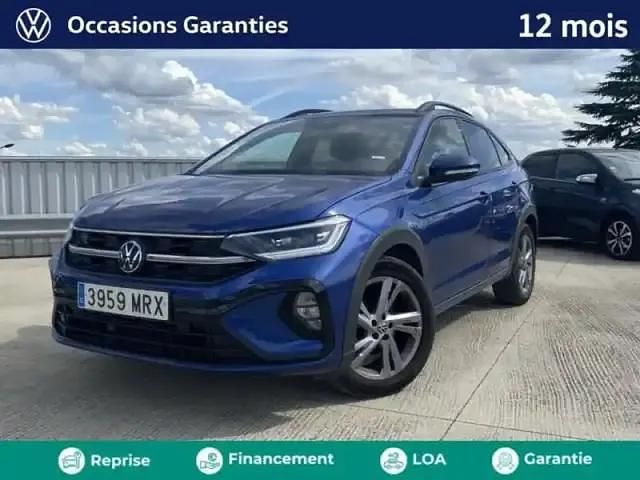 Bleu Utilisé 2024 VW Taigo R-line SUV | 23 989 € (Prix juste) - Image 1/4
