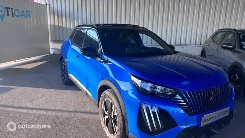 Bleu vertigo (s) Utilisé 2024 Peugeot e-2008 GT SUV | 35 999 € - Image 1/4